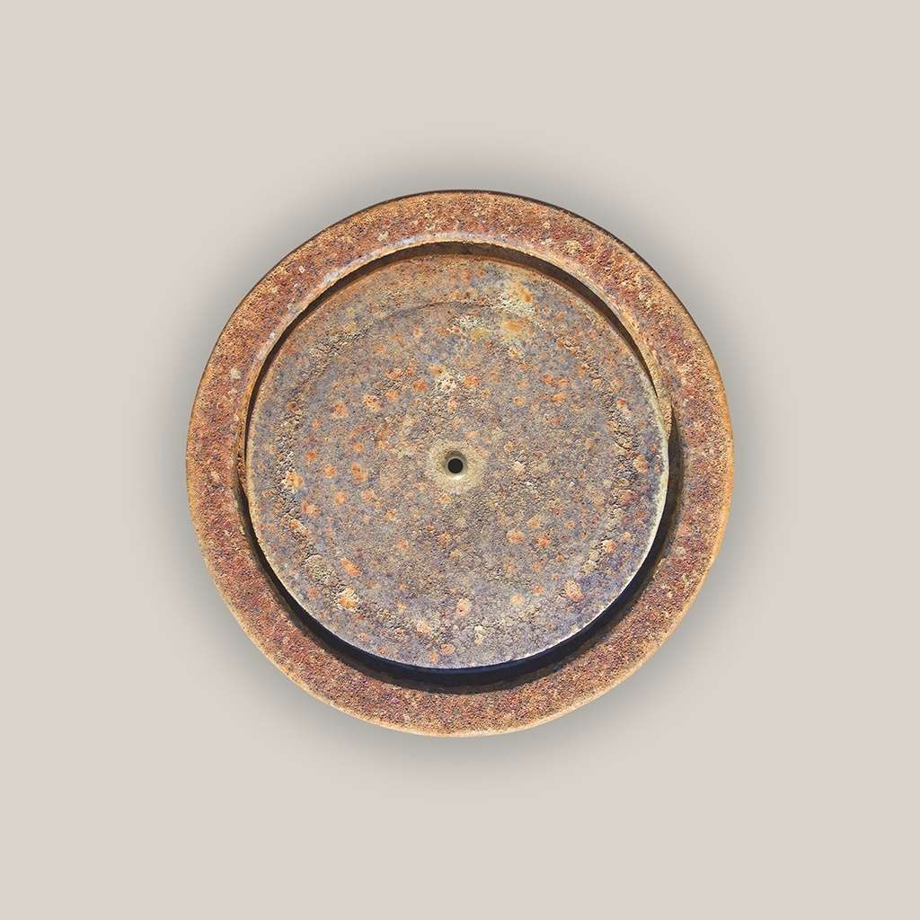 Top view of ceramic fountain jar in turquoise featuring a textured top