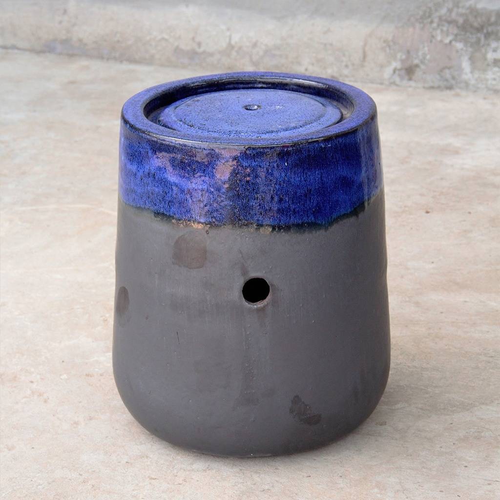 Glazed ceramic fountain jar with a matte gray body and a deep blue glazed top