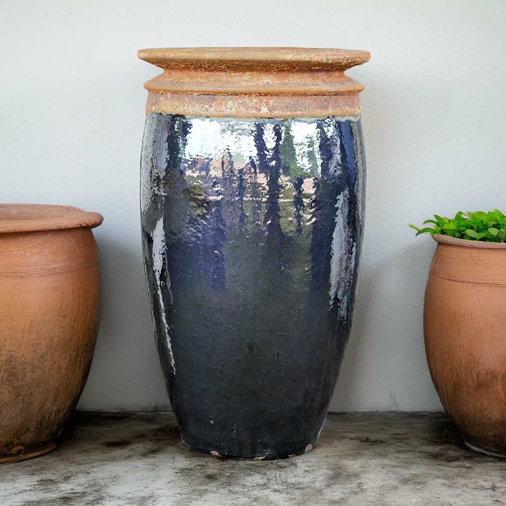 Majestic water ceramic jar fountain with a glossy blue black with textured top