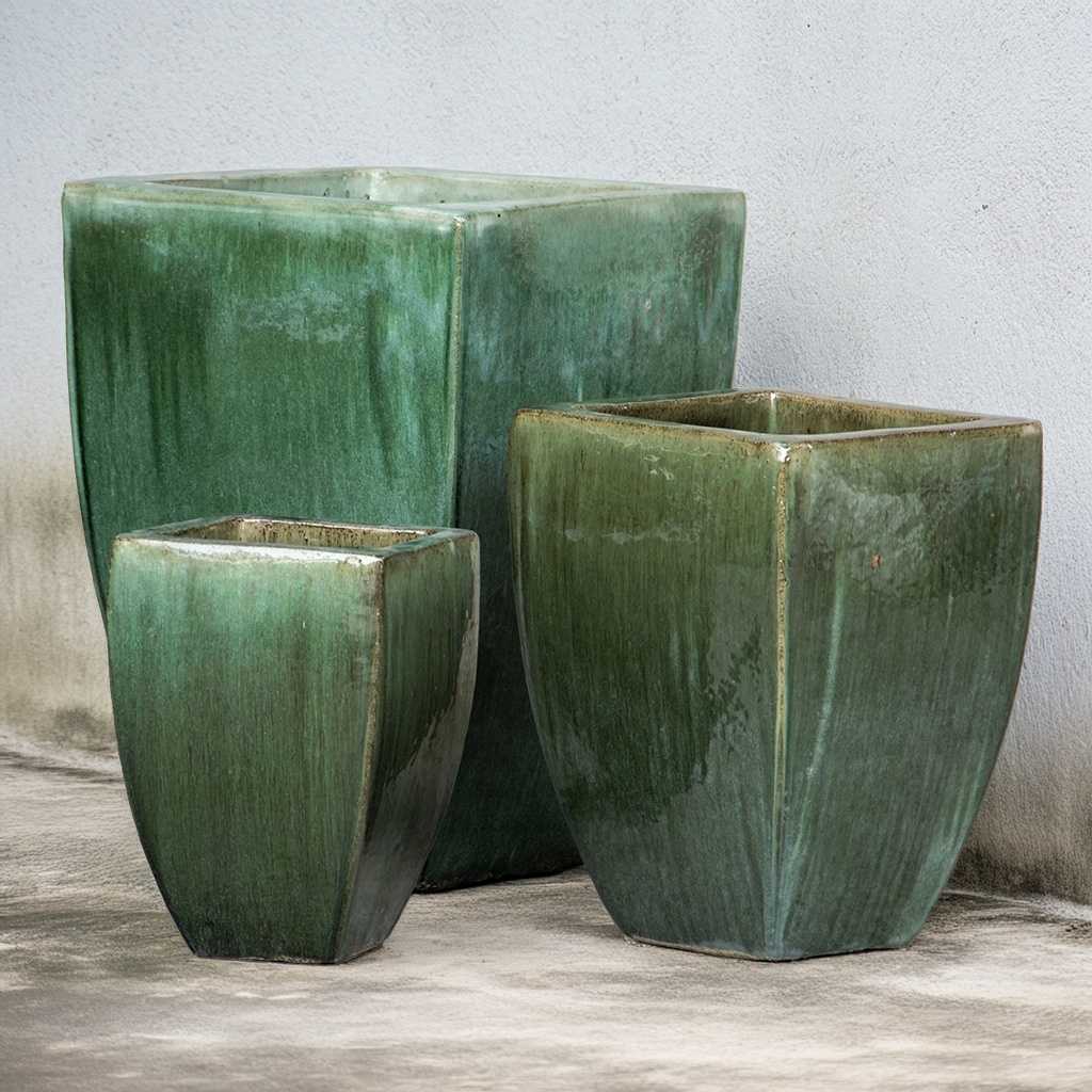 Elegant rounded square ceramic planter with a smooth green glaze