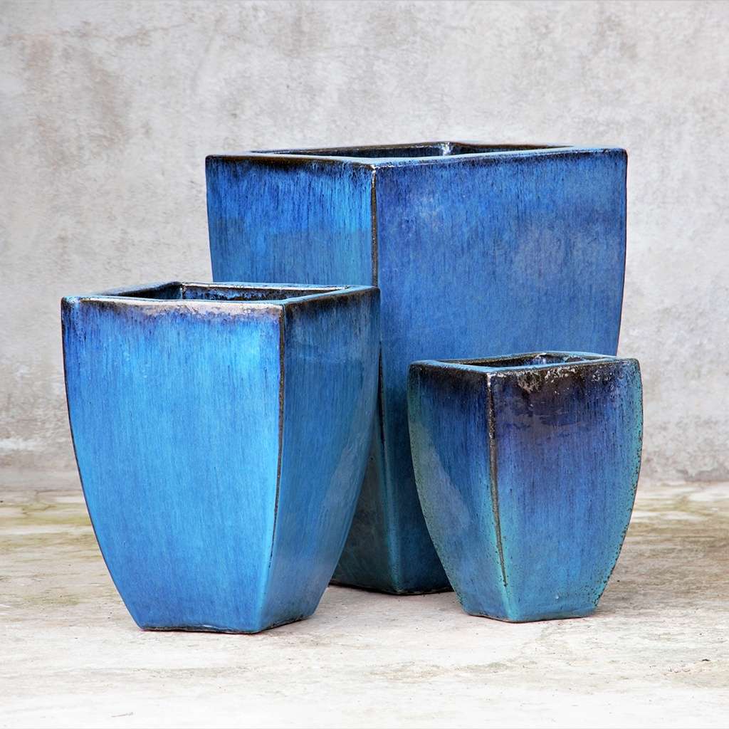 Rounded square planters in a glazed blue tone