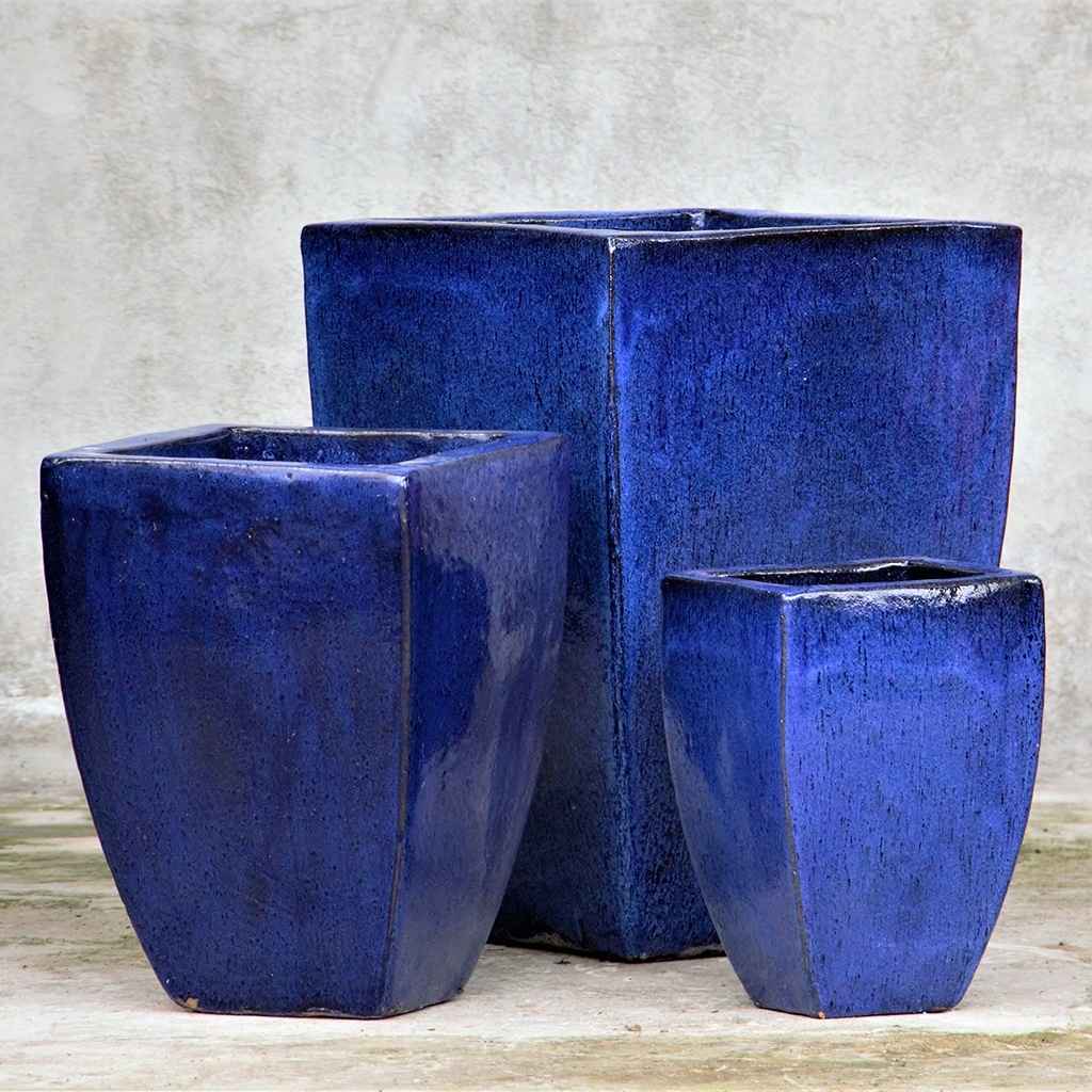 Rounded square planters in a glazed dark blue tone