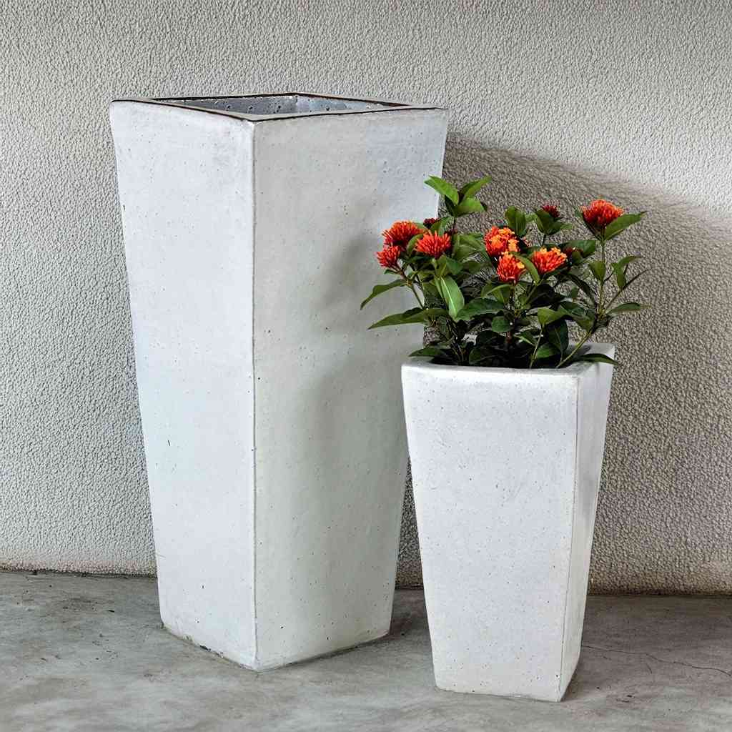 Set of 2 matte white tapered planters with a clean, minimalist design.