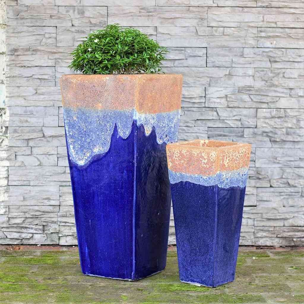 Set of 2 rustic Angkor Blue tapered planters with a textured, natural finish