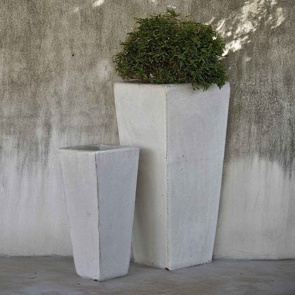 Matte white tapered planters in two sizes, perfect for minimalist indoor or outdoor décor