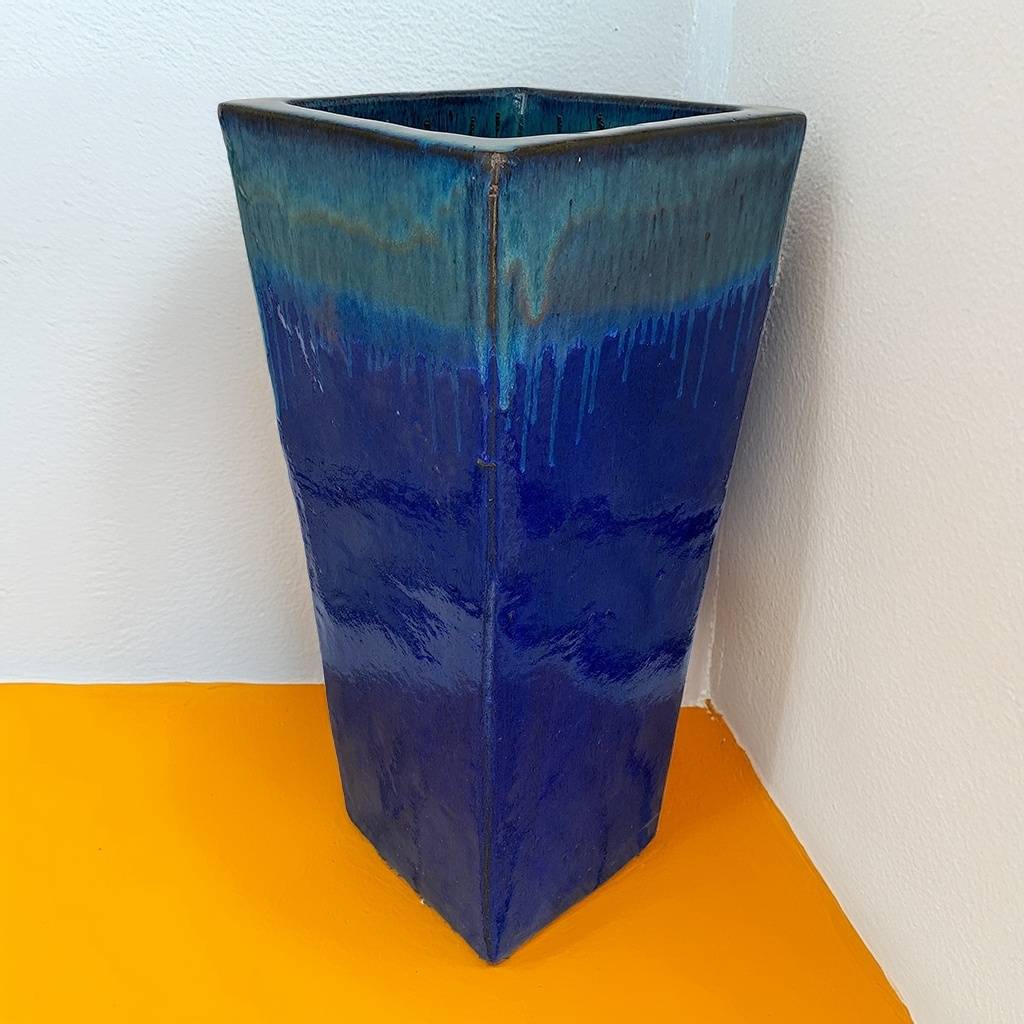 Glazed blue green tapered planter with a smooth, glossy finish
