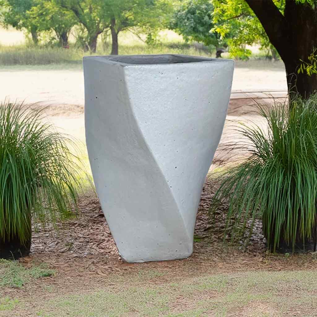 White twisted square planter with a sculptural design and smooth finish