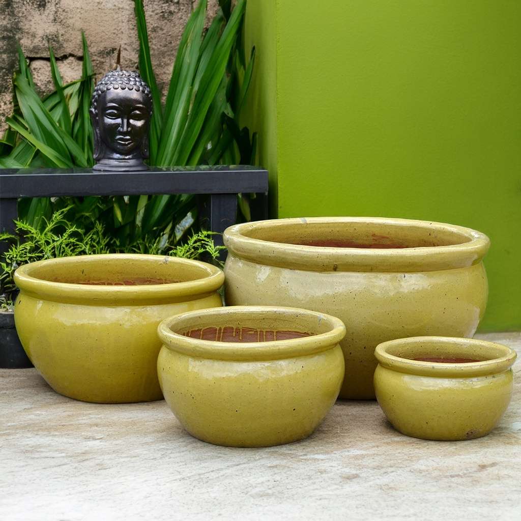 Wholesale Set of 4 Low, wide rounded pot with a smooth yellow glaze