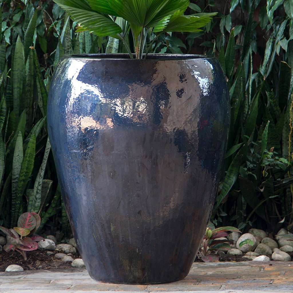 Glazed egg-shaped planter in blue black finish