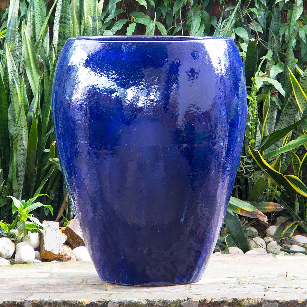 Glazed egg-shaped planter in vibrant blue finish