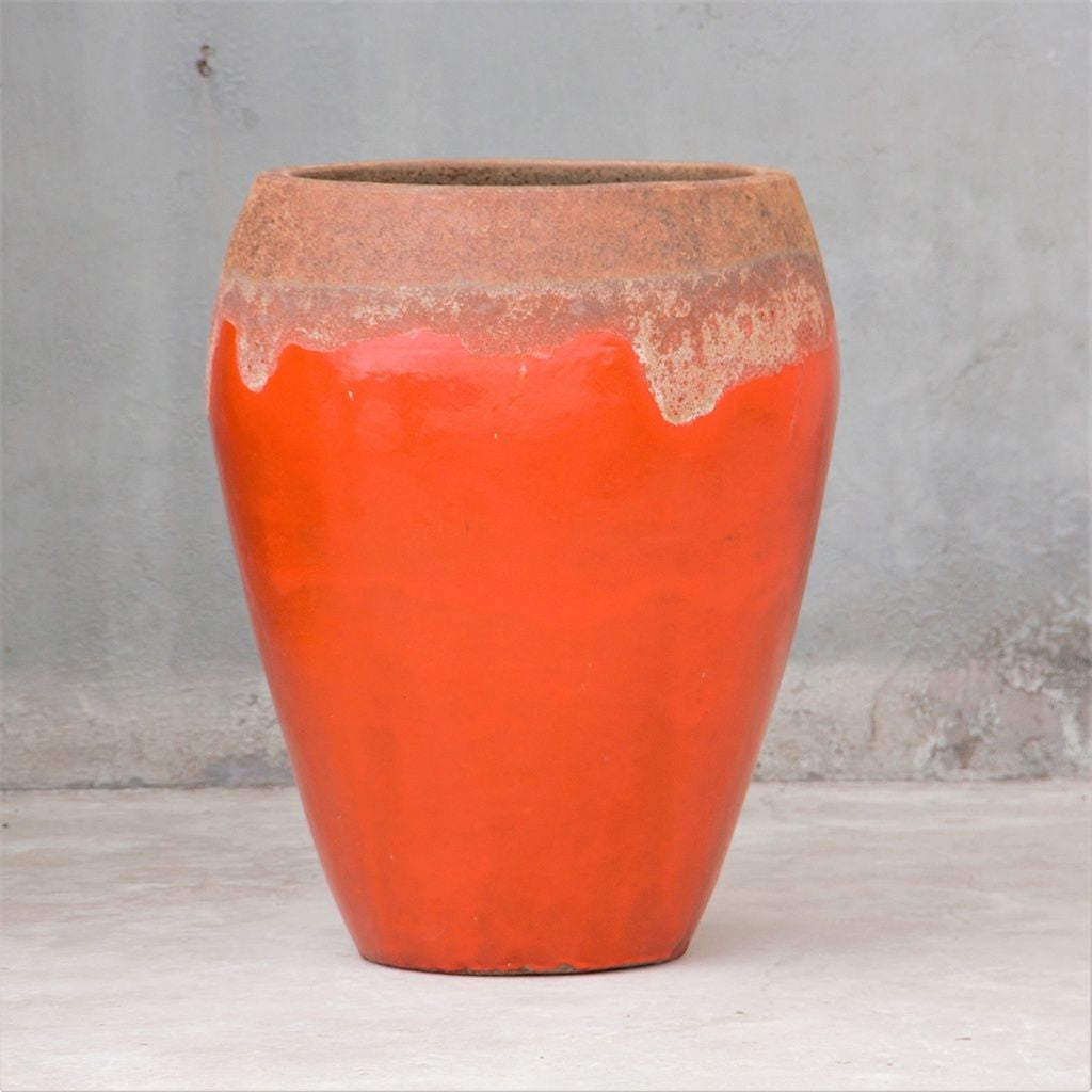 Egg-shaped planter in rustic orange