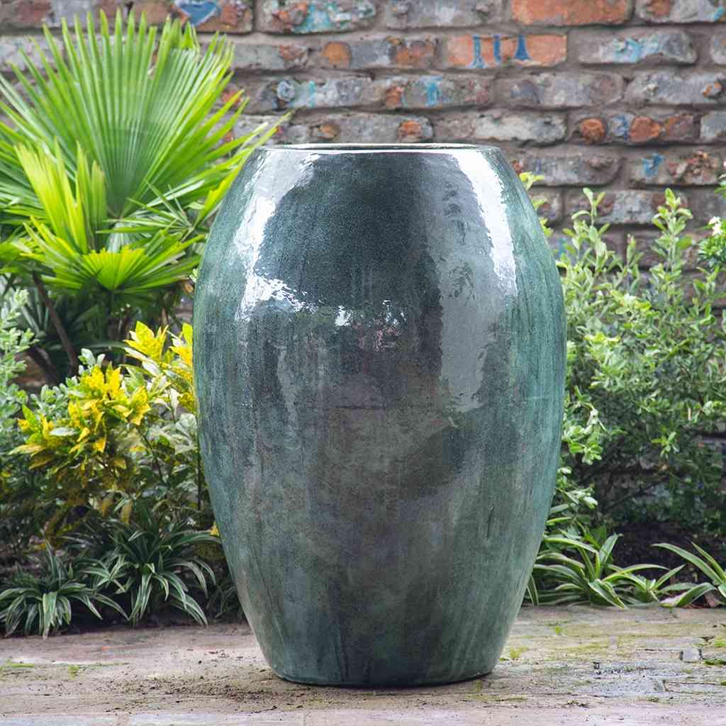 Tall barrel-shaped floor vase with a smooth opal green glaze