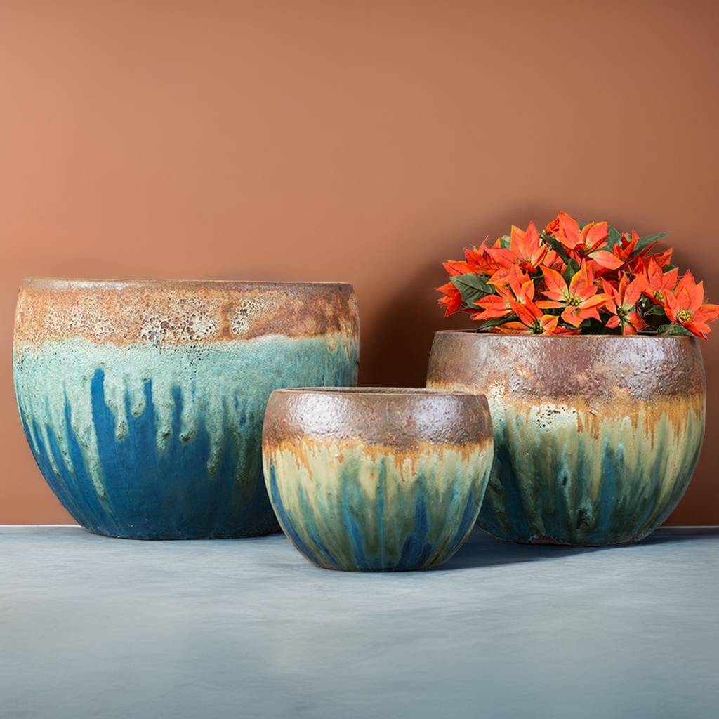 Wholesale Two-tone glazed ceramic planters featuring blue and green hues with brown and gold drip-effect accents