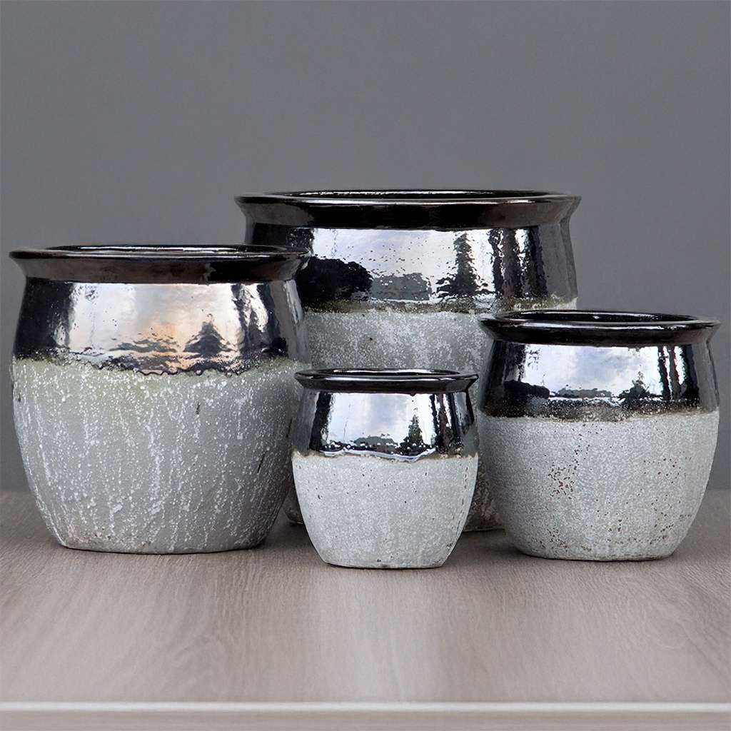 Rounded ceramic planter with a textured gray body and a glossy black top