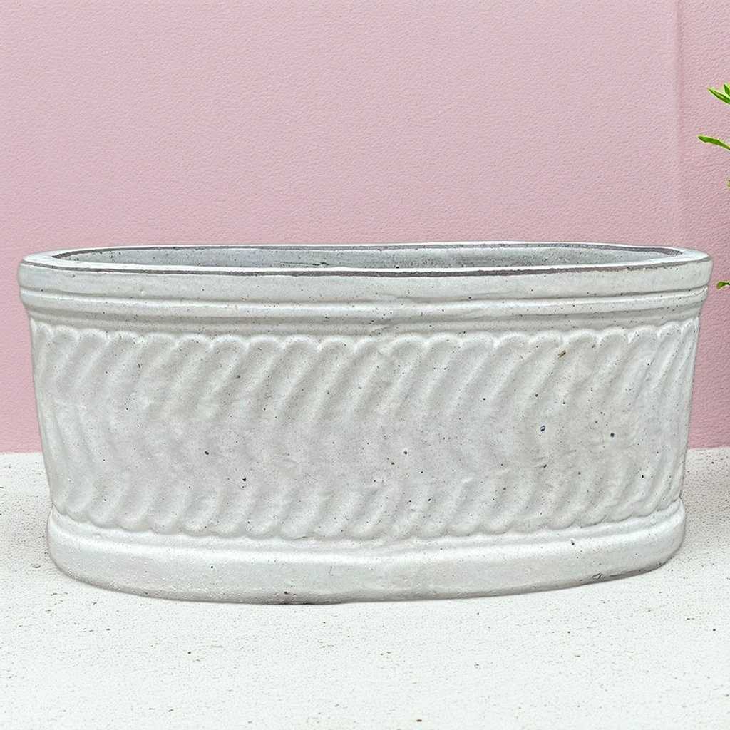 Rectangular planter in white with a wavy embossed texture