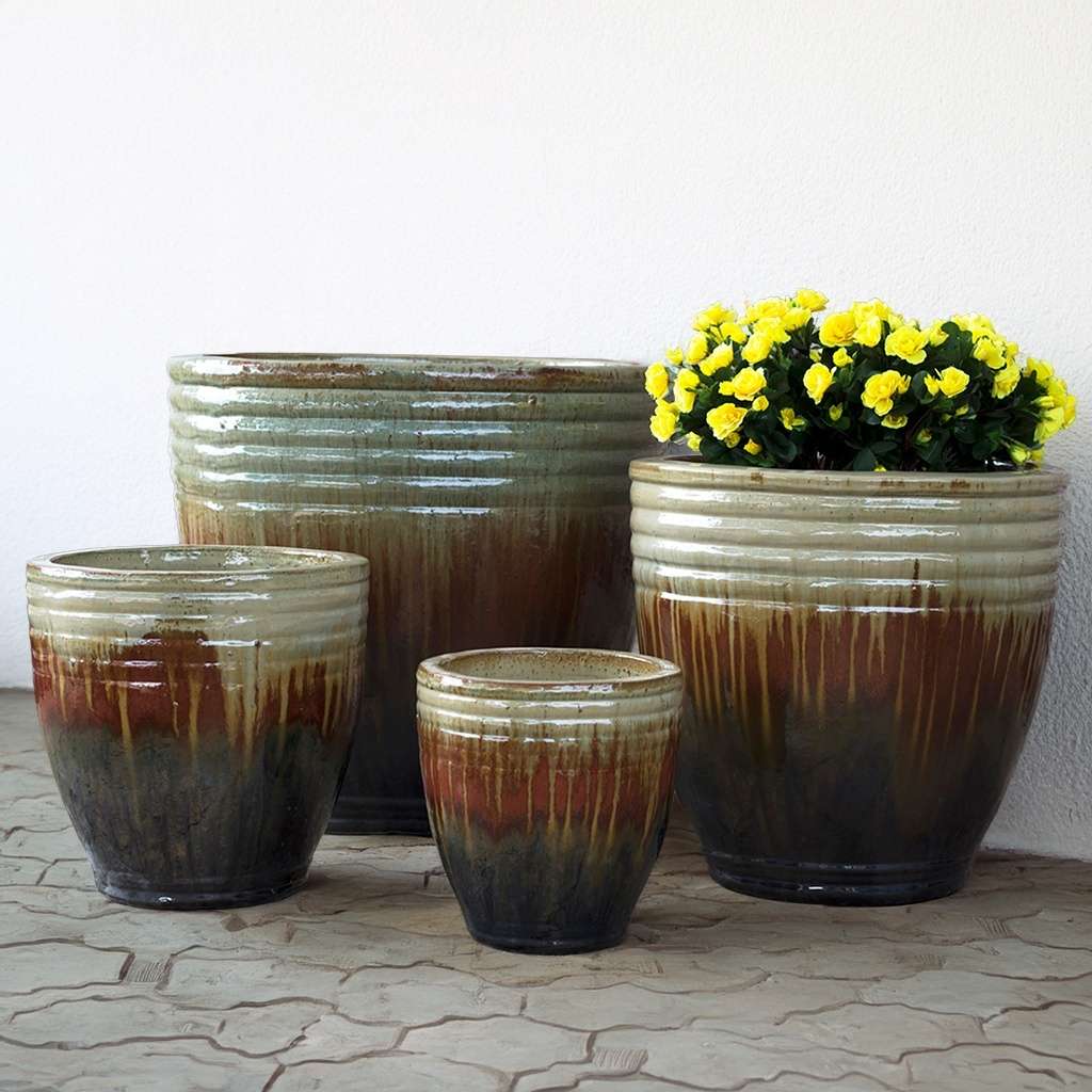 Bulk Ribbed ceramic planter in brown with a cream dripping effect and horizontal banding