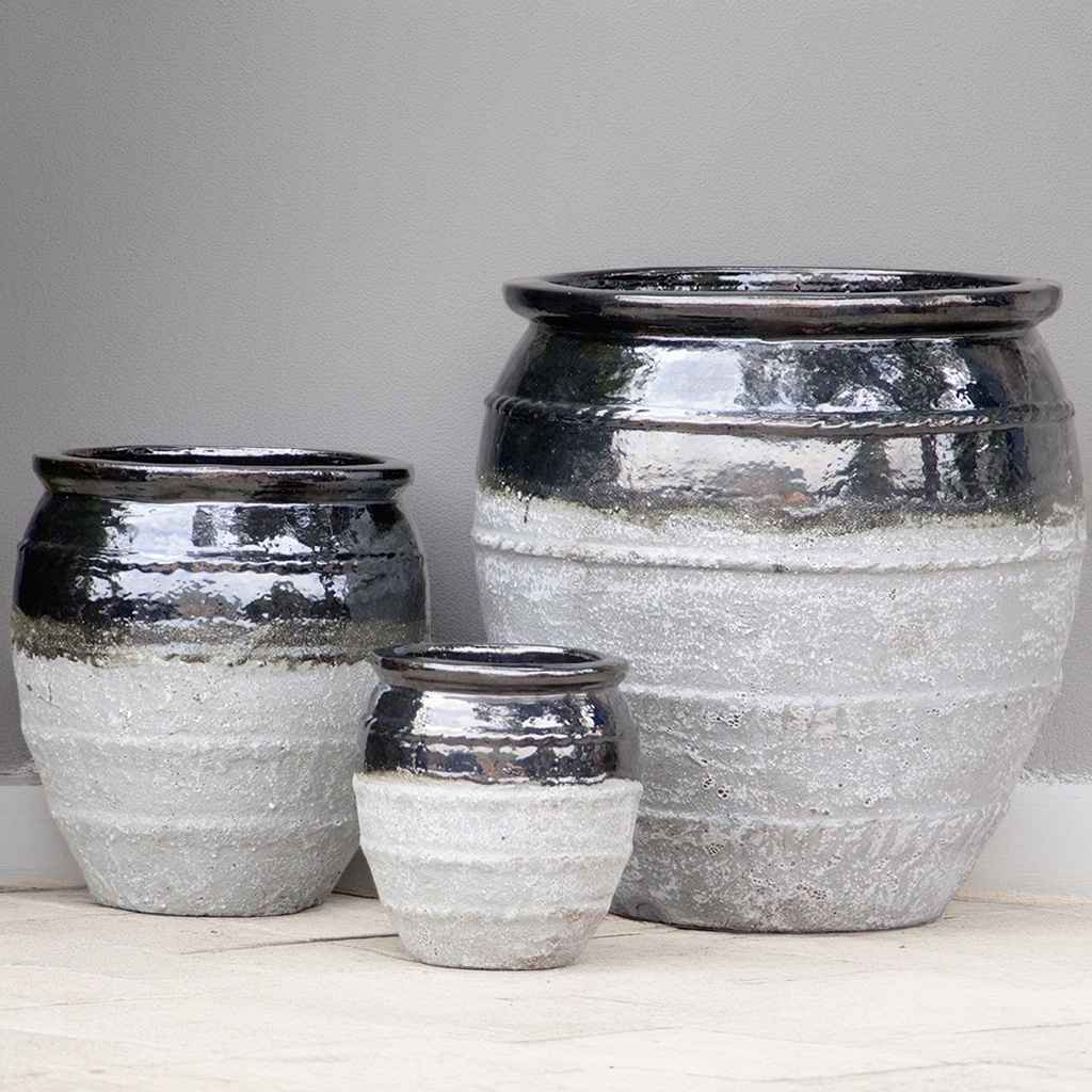 Two-toned rounded ceramic planters featuring a muted grey body with subtle gold flecks, glossy black rim, and rope-texture accents