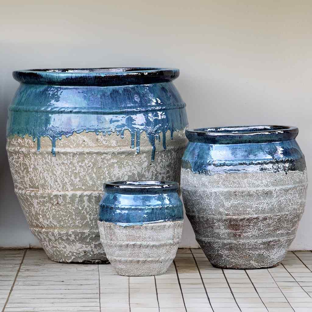 Two-toned rounded ceramic planters in muted grey with subtle gold flecks, featuring a blue-green rim and rope-texture accents