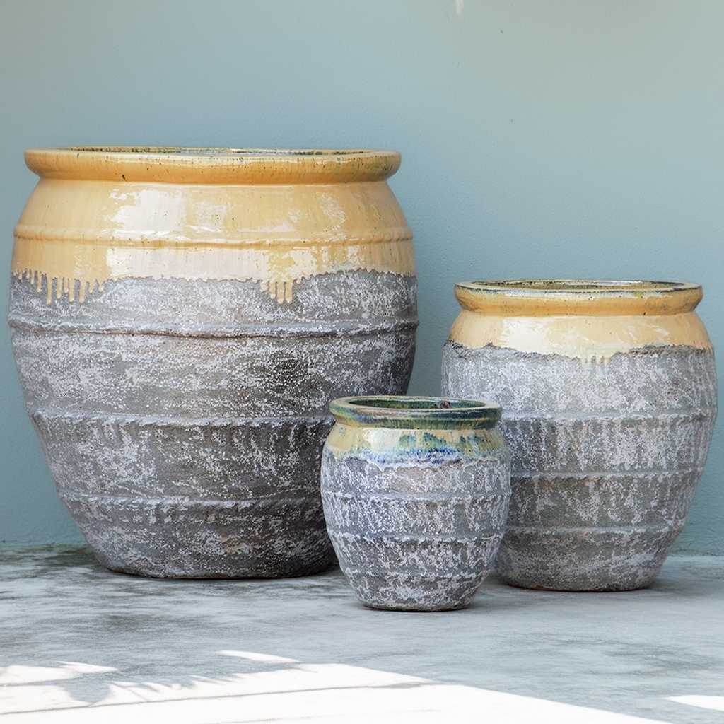 Two-toned rounded ceramic planters in muted grey with subtle gold flecks, featuring a gold-toned rim and rope-texture accents