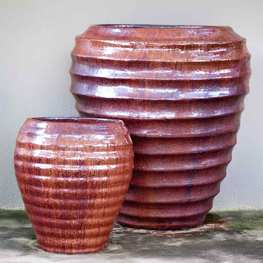 Set of 2 rounded ribbed planters with a sleek metallic finish