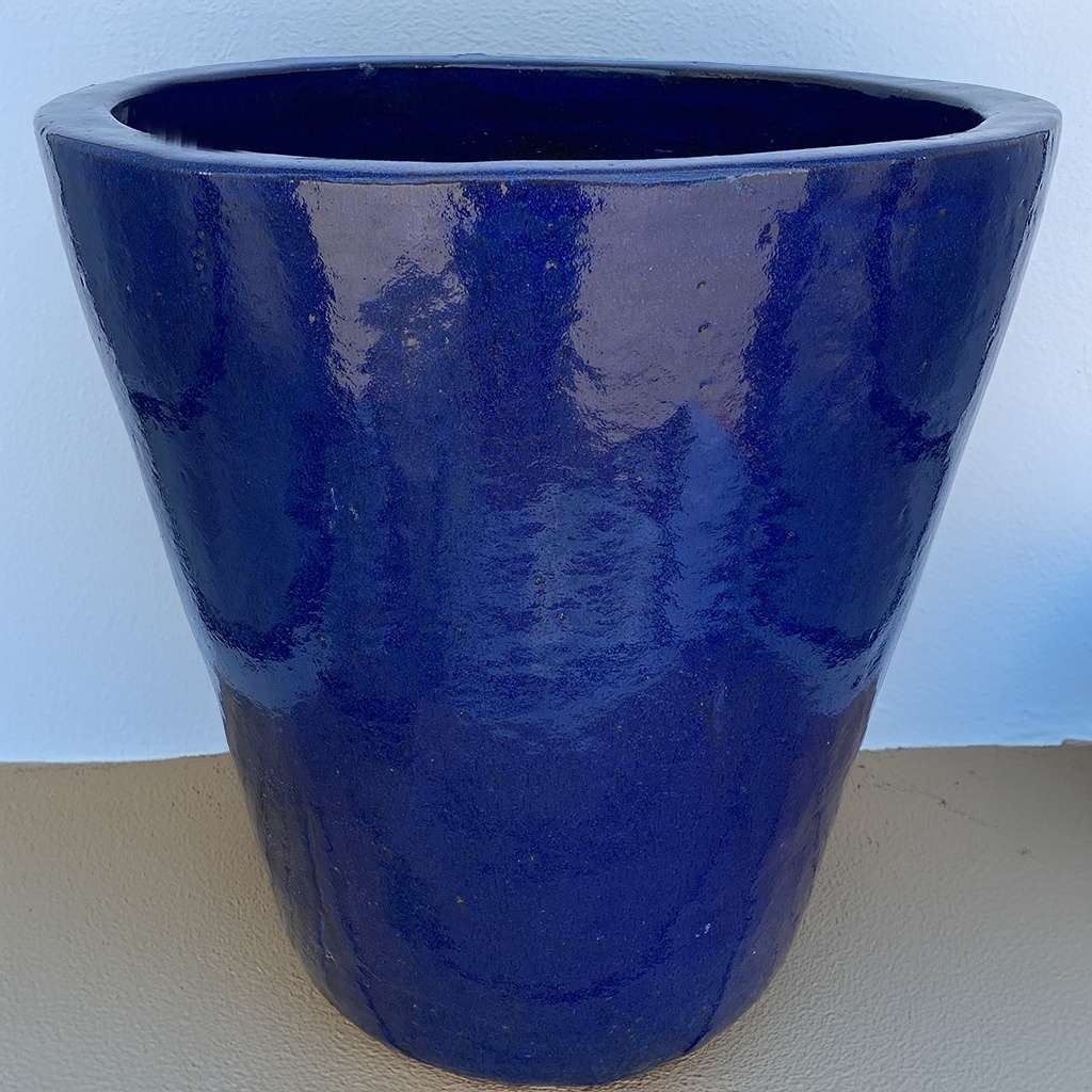 Tapered cylinder planter pots with wide mouths, featuring a sleek glossy dark blue finish and smooth, modern design