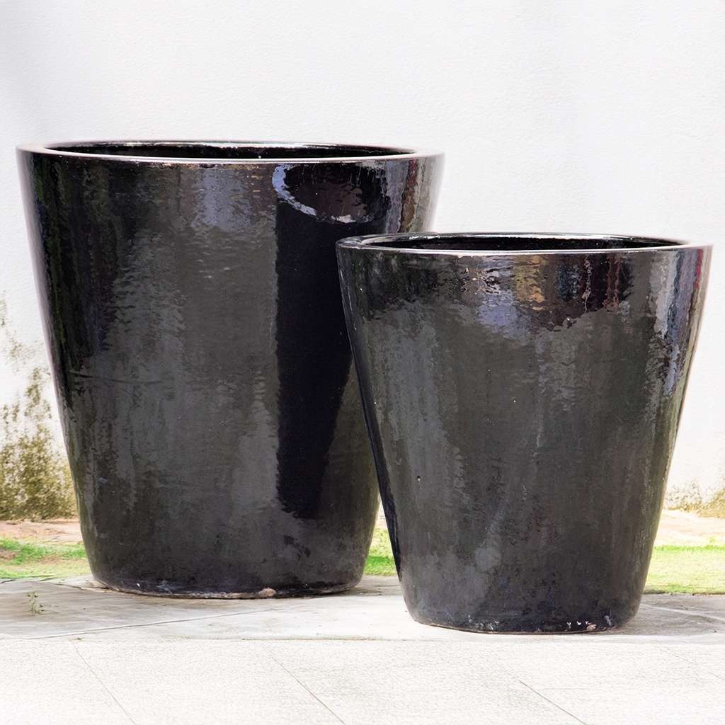 Tapered cylinder planter pots with wide mouths and a glossy black finish
