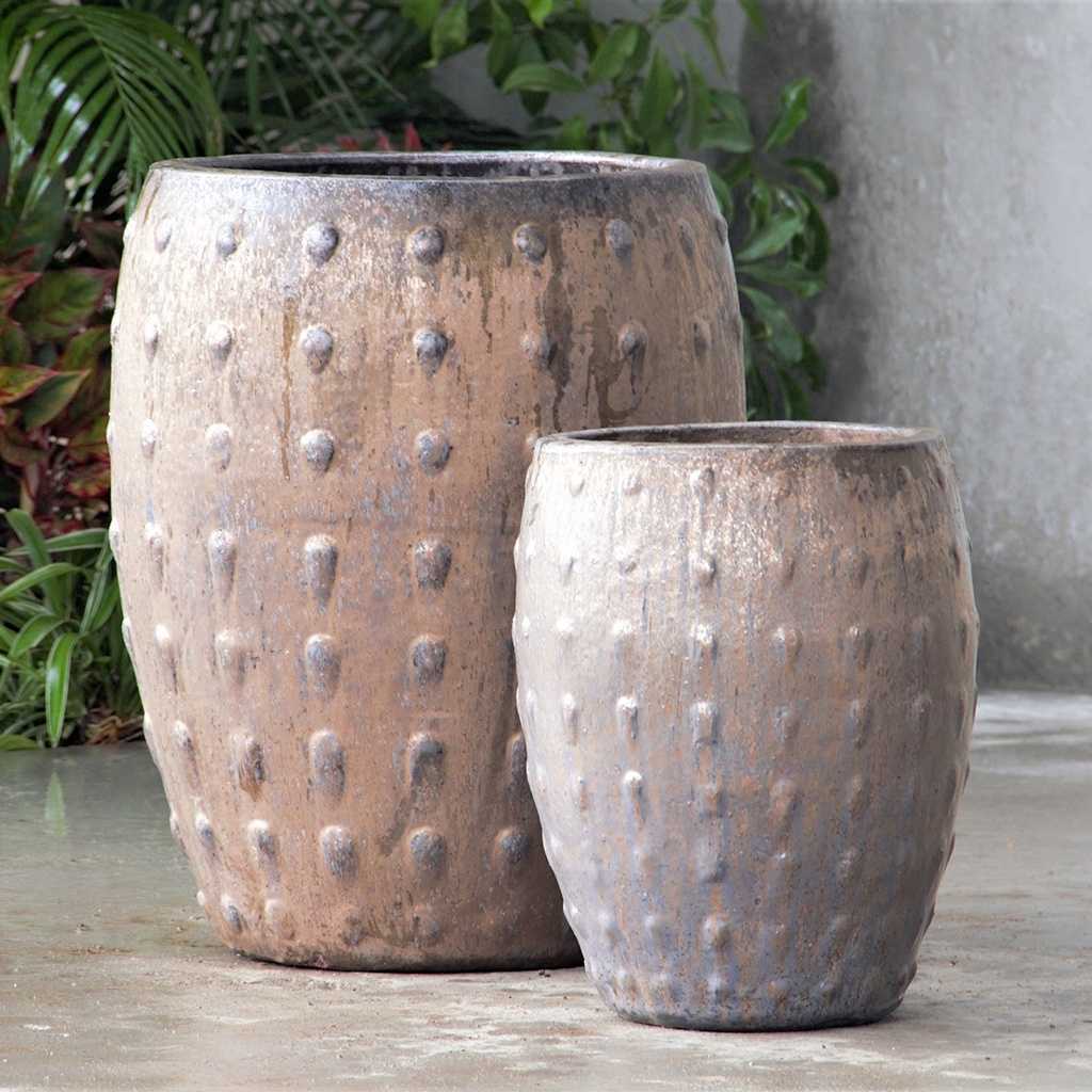 Wholesale Barrel-shaped planters in a gray glaze featuring a raised dot texture