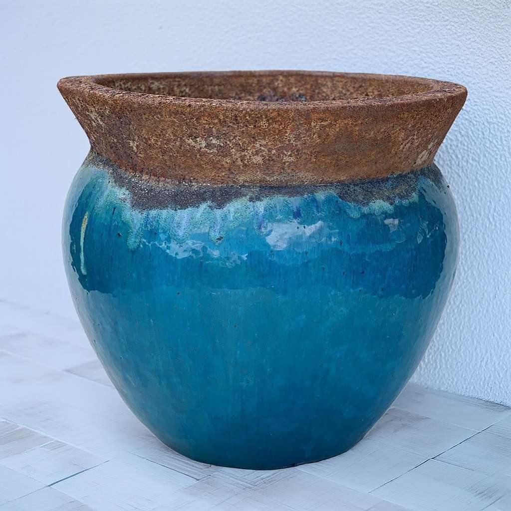 Glossy blue rim planter with rustic wide opening