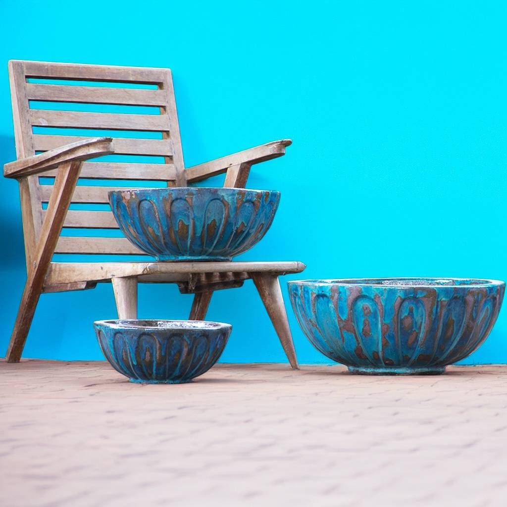 Round low bowl ceramic planters with a blue and copper weathered finish for a rustic, vintage appeal