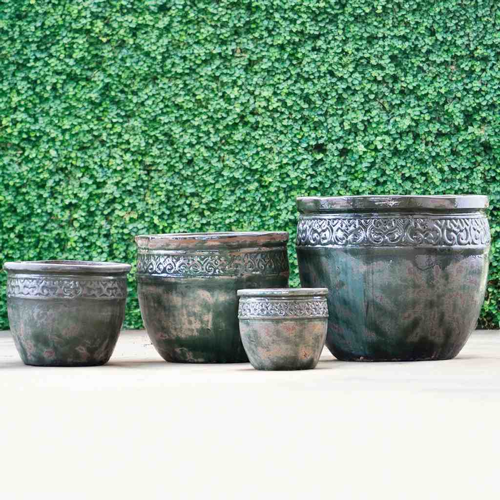 Wide mouth ceramic planters in dark mottled green and gray with an aged, weathered finish for a vintage, rustic appeal