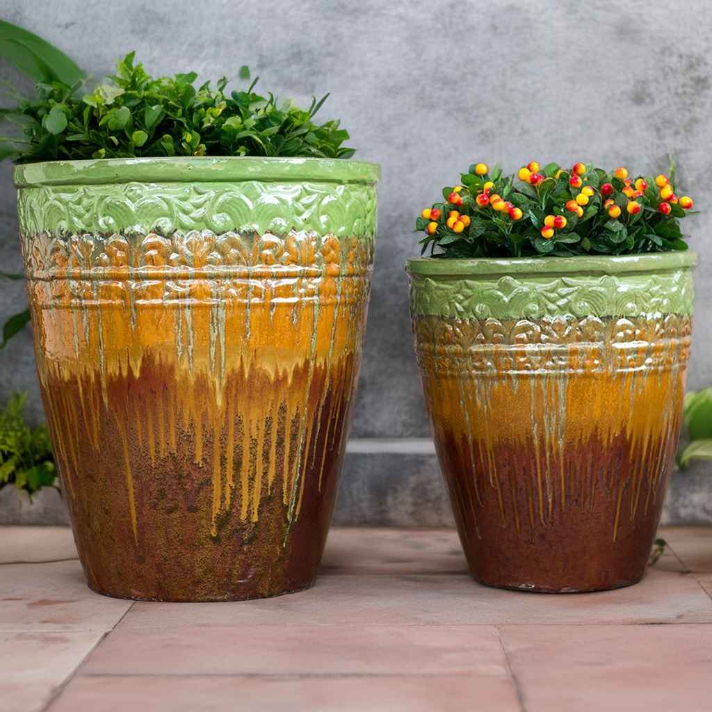 Bulk Tall round ceramic planter with embossed banding and an ombre glaze transitioning from light green at the top to amber in the middle and dark brown at the base