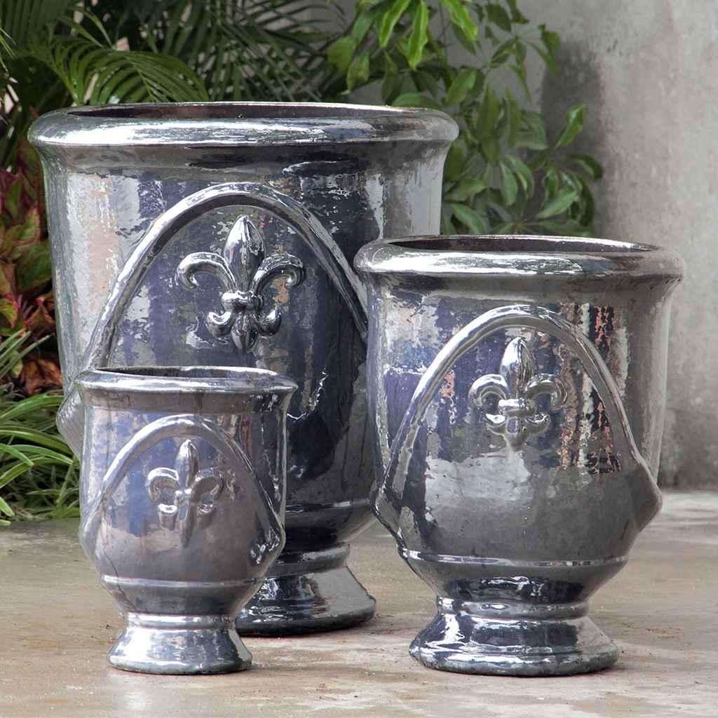 Set of classic urn planters in metallic silvery grey with an embossed Fleur-de-Lis design for elegant, timeless style