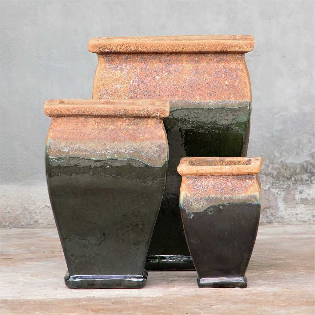 Two-toned flared square-rimmed ceramic planter featuring a sleek black glaze and a reddish-brown textured rim for a bold, rustic contrast