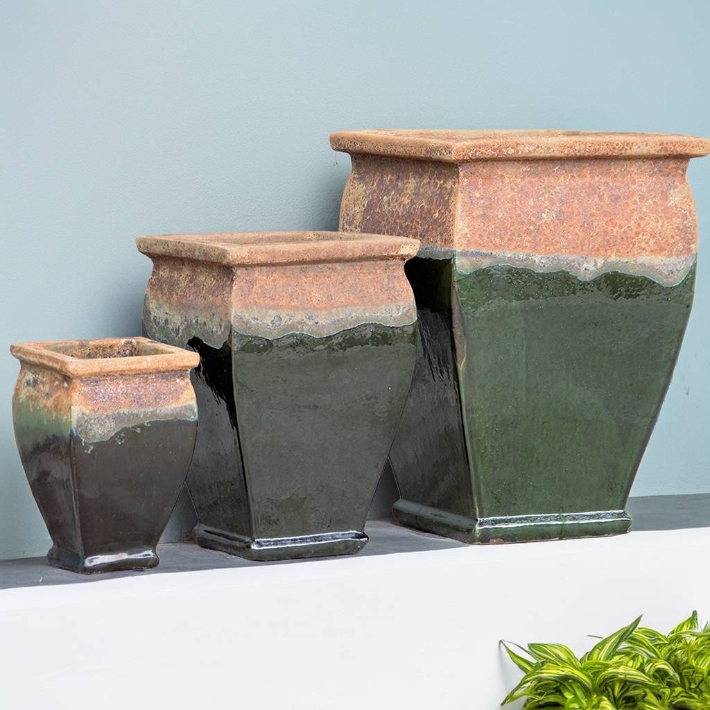 Two-toned flared square-rimmed ceramic planter with a dark glossy green body and a contrasting terracotta rim