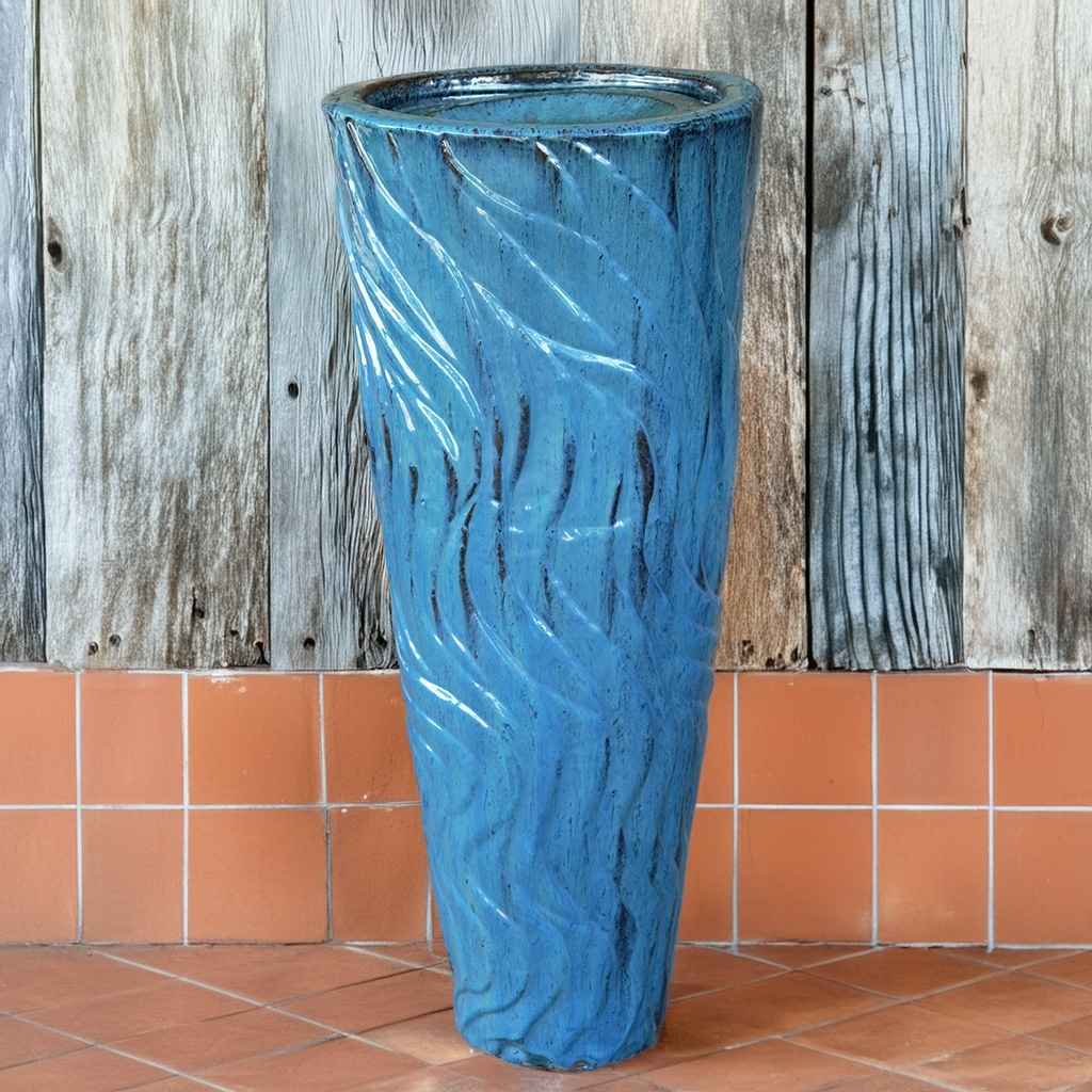 Tall ceramic fountain pot in a glossy blue glaze finish