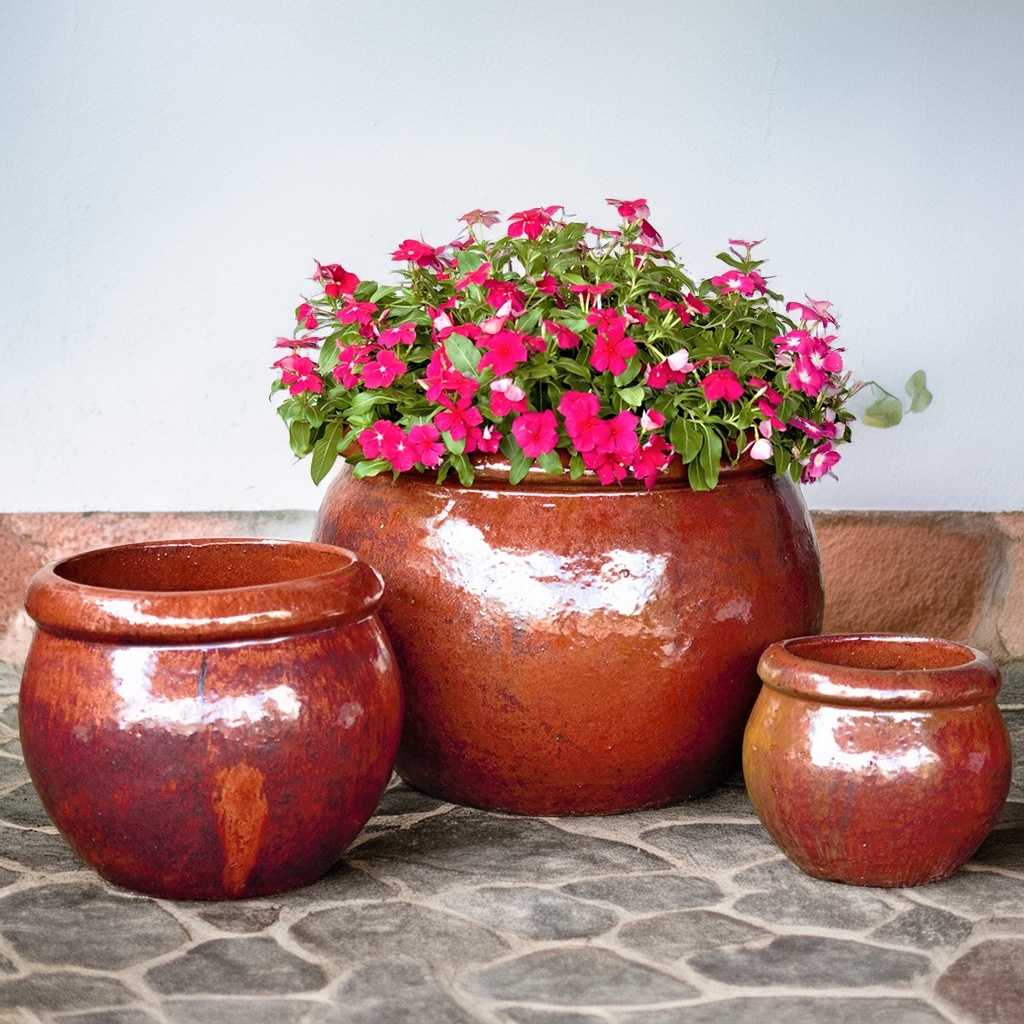 Wholesale Round planters with a copper red rustic finish