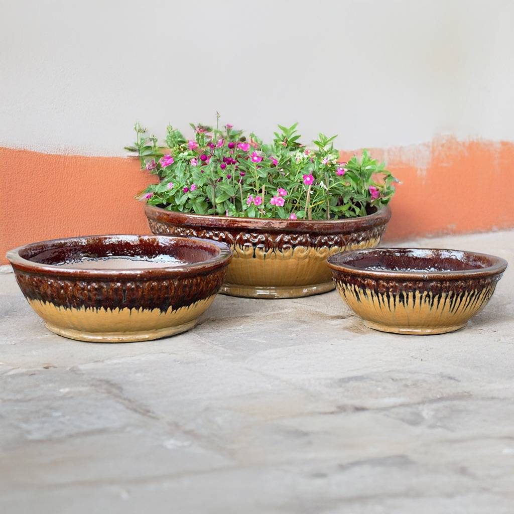 Elegant scroll low bowl ceramic planter in beige, featuring intricate scroll detailing and a contrasting dark brown rim