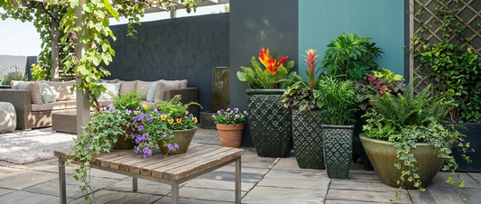 Outdoor patio with wholesale ceramic planters creating a focal point