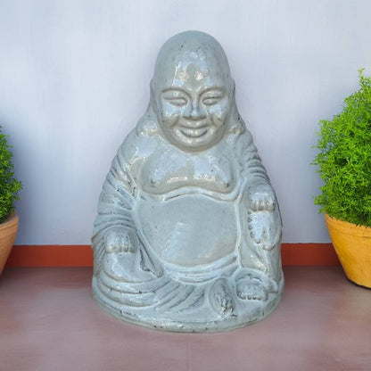 Bulk Glossy Buddha statue in muted off-white with bluish undertone, featuring a serene expression and smooth finish