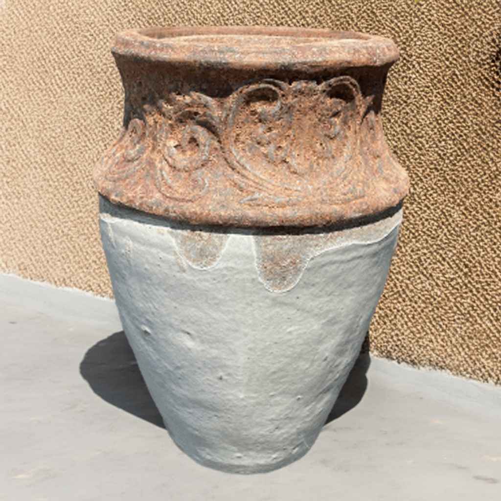 Artisan ceramic fountain jar in off-white with a textured rustic top