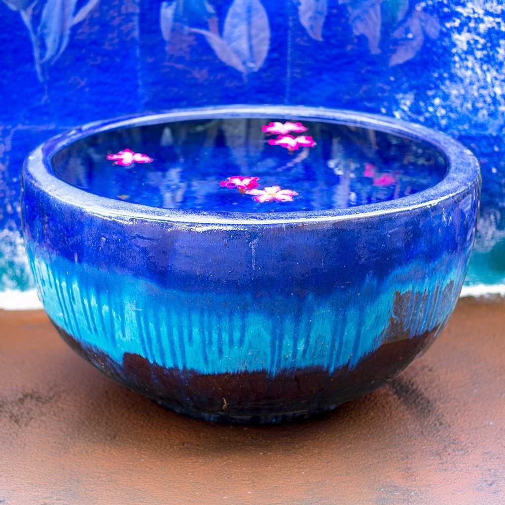 Wholesale Wide round planter pot in blue and brown with a striking dripping glaze effect