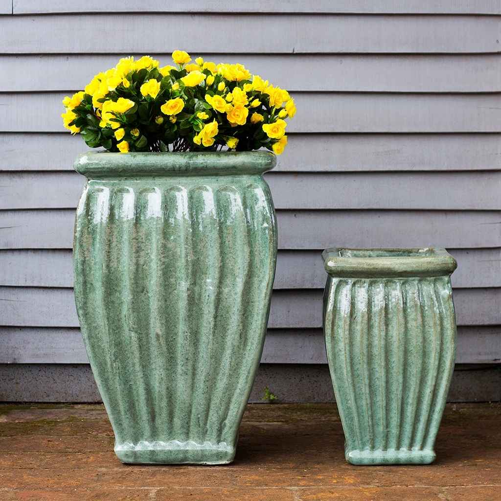 Wholesale Tall fluted planter with elegant vertical ridges in pastel green