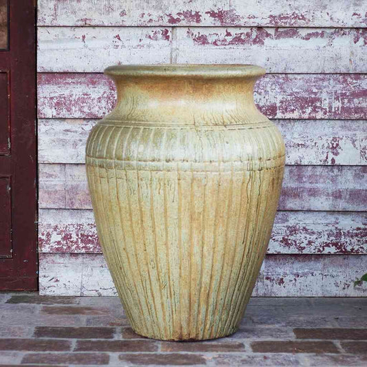 Wholesale Beige fluted amphora planter with vertical grooves and a classic, elegant shape