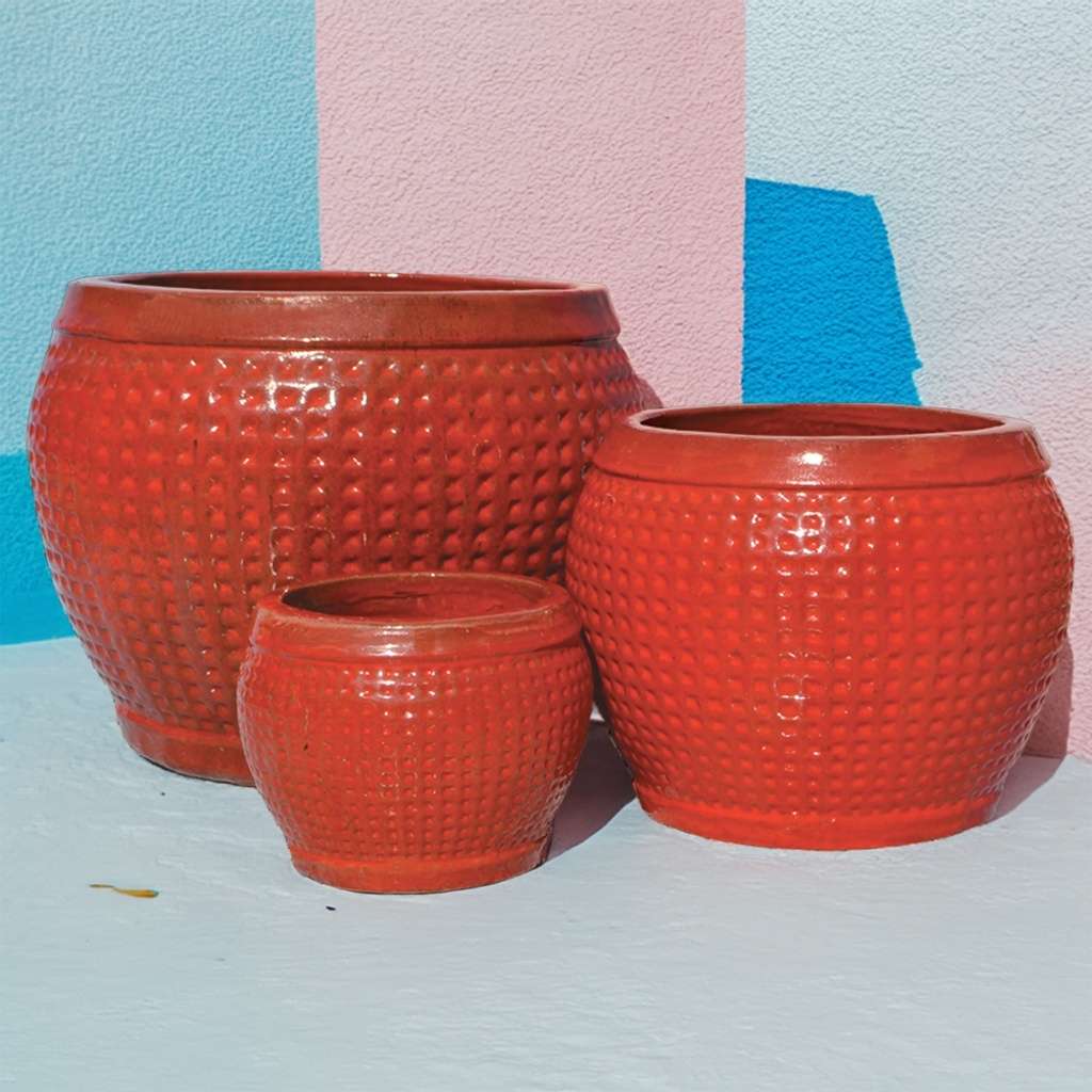 Bulk Reddish-brown round ceramic planter pots featuring a raised grid texture