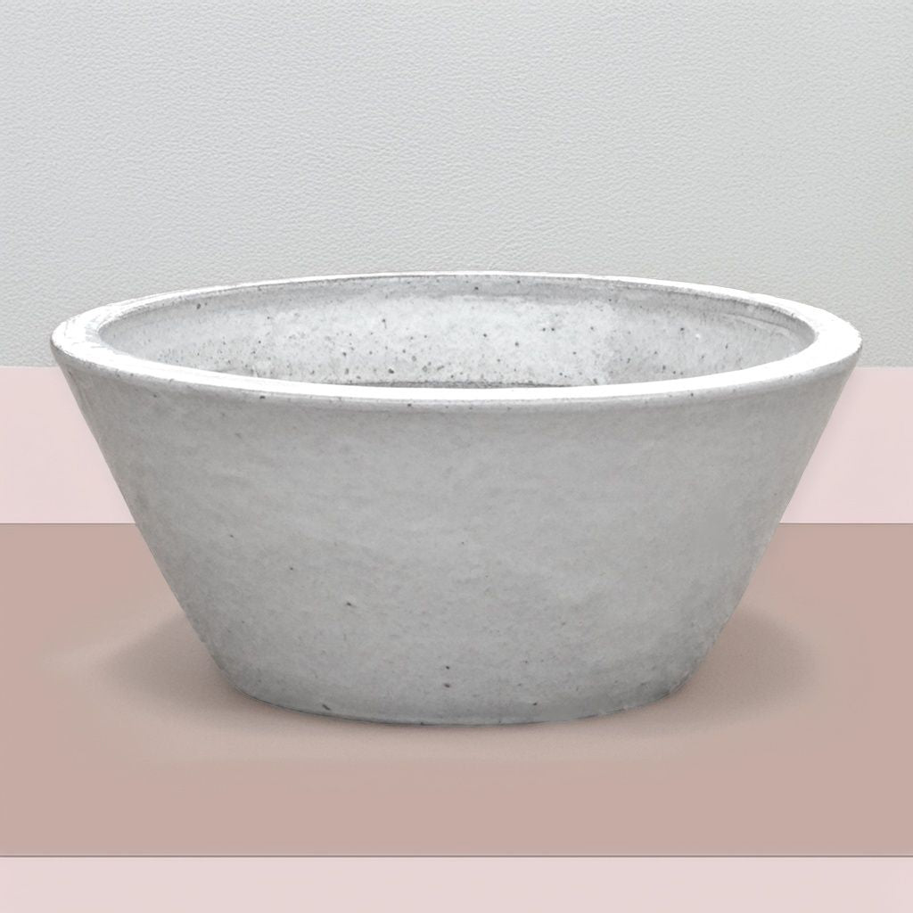 Cone-shaped ceramic low bowl planters in white with wide rims
