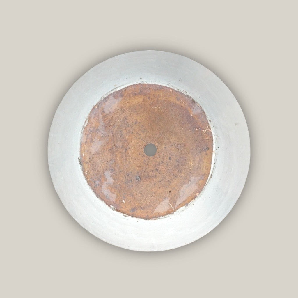Bottom view of cone-shaped, wide-rimmed ceramic low bowl planters in white