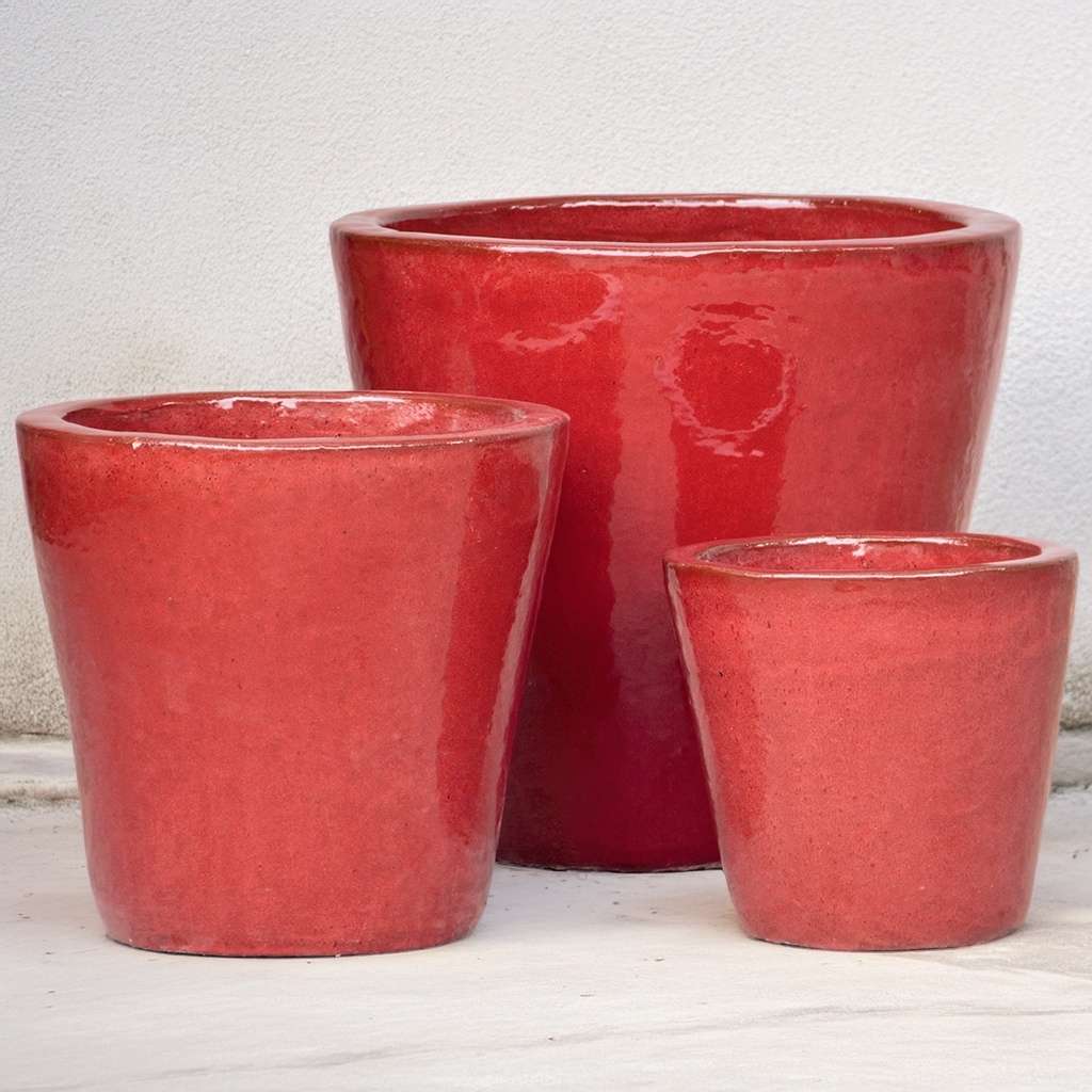 Tapered round ceramic planter with a smooth, glossy red finish