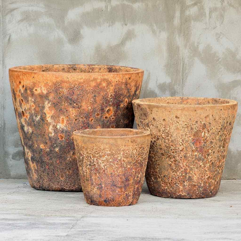Tapered round ceramic planter in reddish-brown with an aged, weathered finish