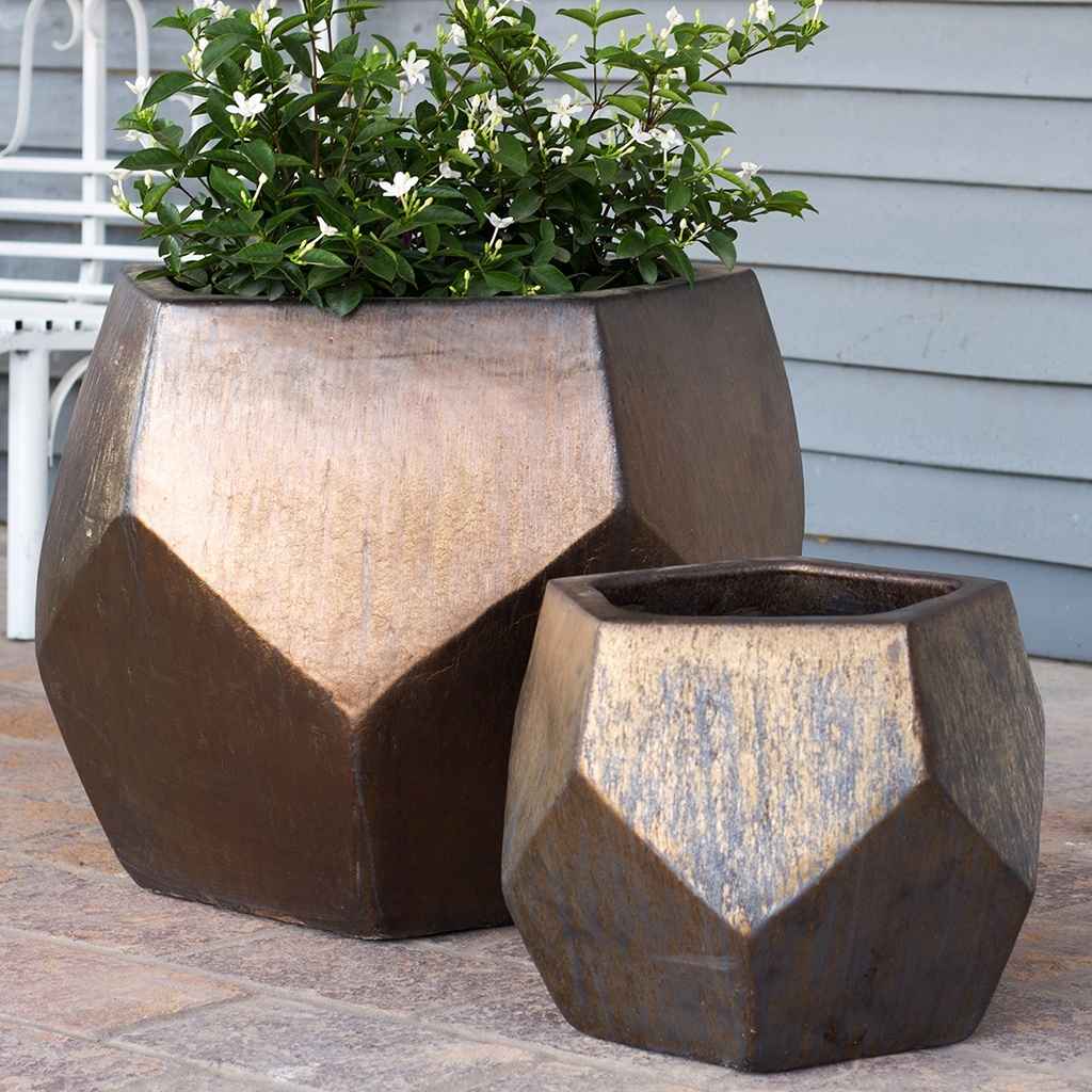 Wholesale Faceted geometric polygon ceramic planter in metallic brown with sharp edges and a modern angular design