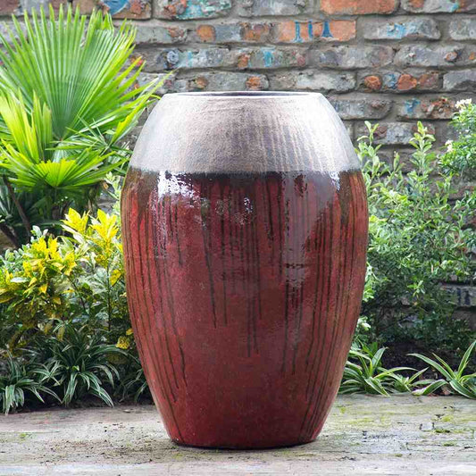 Bulk Tall barrel-shaped floor vase in deep maroon with a metallic rim and brown drip-effect finish